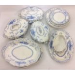 AN EARLY 20TH CENTURY BLUE AND WHITE PART DINNER SET Comprising three oval tureens, two serving