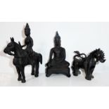 A COLLECTION OF THREE CHINESE BRONZE FIGURES To include a seated Buddha, a figure and horse and a