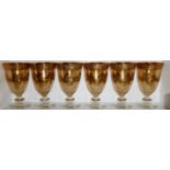 A VINTAGE SET OF SIX VENETIAN MURANO GLASS AND GILT WINE GOBLETS Tapering gold tone body with gilt