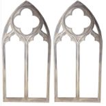 A PAIR OF LARGE FIBRE GLASS GOTHIC ARCH WINDOW PANELS.