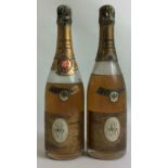 LOUIS ROEDERER, TWO BOTTLE OF VINTAGE 1973 CHAMPAGNE Having gold caps and labels 'Reims Imported