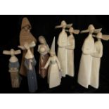 LLADRO, A COLLECTION OF SEVEN 20TH CENTURY PORCELAIN FIGURINES Comprising two boxed examples of nuns