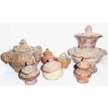 A COLLECTION OF SEVEN CHINESE TERRACOTTA POTTERY STORAGE JARS AND COVERS Including a circular jar