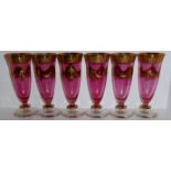 A VINTAGE SET OF SIX VENETIAN MURANO GLASS AND GILT CHAMPAGNE FLUTES Tapering pink bodies with