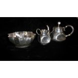FABERGÉ, A LATE 19TH CENTURY RUSSIAN SILVER BACHELOR'S TEA SERVICE Comprising a teapot with cube