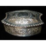 A VICTORIAN SILVER OVAL TRINKET BOX With concave sides and embossed decoration, hallmarked