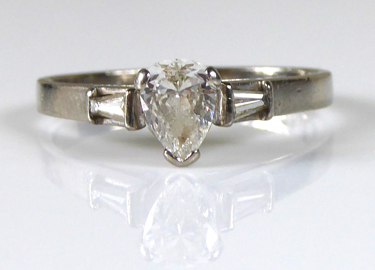 AN 18CT WHITE GOLD AND DIAMOND SOLITAIRE RING Having a pear cut diamond set between two tapering - Image 2 of 2