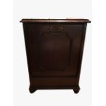 AN EDWARDIAN MAHOGANY COAL PURDONIUM Sold together with an oak Sutherland table with shaped edge,