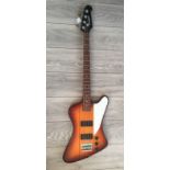 WESTFIELD, A 'THUNDERBIRD' STYLE ELECTRIC BASS GUITAR Having a sunburst finish, white scratch