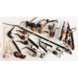 A COLLECTION OF 19TH CENTURY GERMAN PORCELAIN BLACK FORREST HUNTING TOBACCO PIPES Including a