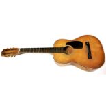 A 1960'S AUDITION ACOUSTIC GUITAR With natural finish and a 'Dreadnought' shaped body.