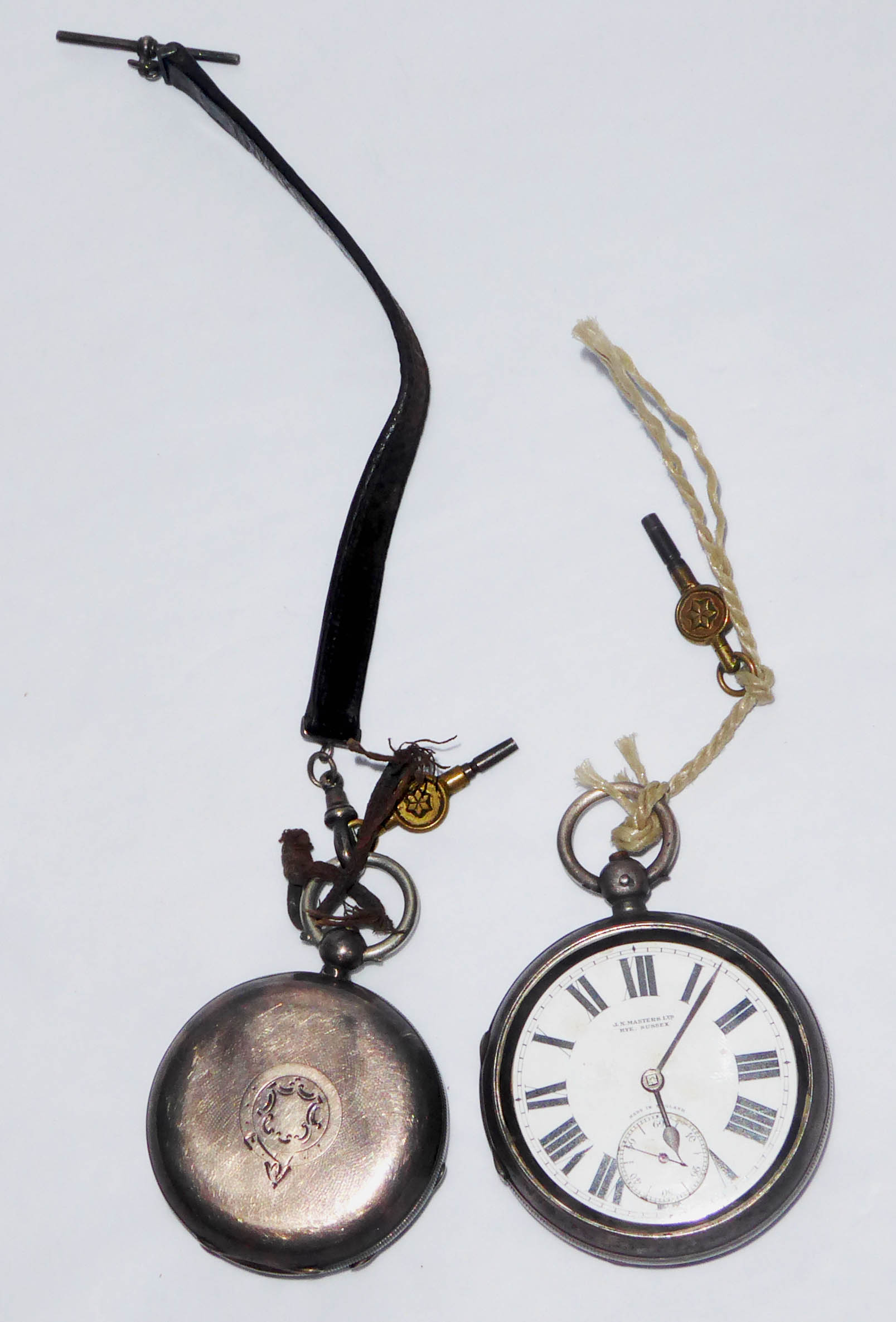 TWO 19TH CENTURY SILVER OPEN FACED POCKET WATCHES To include a Waltham Mass pocket watch, the