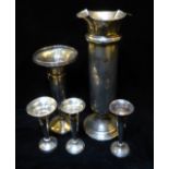 A COLLECTION OF FIVE EARLY 20TH CENTURY FLOWER TRUMPETS Tapering, cylindrical and plain form. (