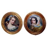 A PAIR OF VICTORIAN REVERSE GLASS OVAL PORTRAITS Two young girls, one wearing a gilt shawl, the