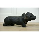 AN 18TH/19TH CENTURY ROOT CARVING IN THE FORM OF A BULL TERRIER. (l 62cm)