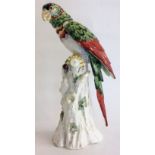 A PORCELAIN FIGURE OF A PARROT Hand painted with colourful plume, bearing the Chelsea gold anchor