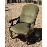 AN EARLY VICTORIAN ROSEWOOD OPEN ARMCHAIR In green velvet upholstery and scroll arms, raised on