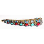 AN ANTIQUE CHINESE WHITE METAL FINGERNAIL GUARD/BROOCH With filigree and enamel decoration. (