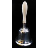 AN EARLY 20TH CENTURY SILVER AND IVORY HAND BELL The turned Ivory handle set with a plain silver