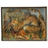 A LATE 19TH CENTURY CASED TAXIDERMY FOX Mounted in a naturalistic setting with prey. (h 57cm x w