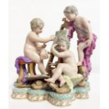 MEISSEN, A 19TH CENTURY PORCELAIN FIGURAL GROUP Featuring cherubs seated at an easel on a scrolled