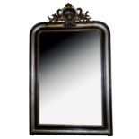 A 19TH CENTURY FRENCH EBONISED AND SILVER GILT CARVED WOOD MIRROR With original mercury plate. (h