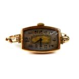 AN EARLY 20TH CENTURY 9CT GOLD LADIES' WRISTWATCH Geometric dial with Arabic numerals and expandable