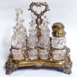 A WILLIAM IV SILVER EIGHT PIECE CONDIMENT SET With scrolling handle over crystal glass condiments,