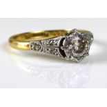 AN 18CT GOLD, PLATINUM AND DIAMOND SOLITAIRE RING. (aprox diamond weight .25ct)
