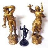 A PAIR OF GILT SPELTER FIGURES Fisherman and Dutch maiden, raised on a naturalistic bases,