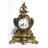 A LATE 19TH/EARLY 20TH CENTURY FRENCH MANTLE CLOCK The enamelled dial with Roman numeral chapter