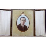 AN EARLY 20TH CENTURY IVORY OVAL PORTRAIT MINIATURE Young gent wearing a brown suit, in a velvet