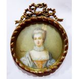 CHARLES EMILE WATTIER, FRENCH, 1800 - 1868, CIRCULAR PORTRAIT MINIATURE ON IVORY Maiden wearing a