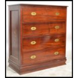 A 20TH CENTURY INDIAN ROSEWOOD CHEST OF DRAWERS Having four long graduated drawers, fitted with