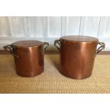 TWO 19TH CENTURY HEAVY GAUGE COPPER POTS With lidded tops and hoop handles. (largest h 31cm)