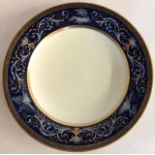 A 19TH CENTURY VIENNA PORCELAIN SHALLOW DISH Having a gilt and pâté-sur-pâté decoration of swags and