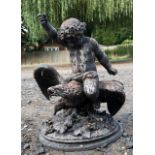 A 19TH CENTURY CAST ZINC GROUP, PUTTI RIDING AN EAGLE. (37cm)