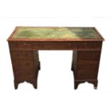 A VICTORIAN MAHOGANY TWIN PEDESTAL DESK Green tooled leather writing surface. (120cm x 58cm x 74cm)