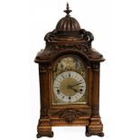 LENZKIRCH, A 19TH CENTURY WALNUT CASED MANTLE CLOCK With brass, silvered dial and Westminster