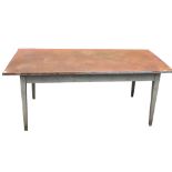 A 19TH CENTURY PINE FARMHOUSE TABLE With rusted metal top, raised on square tapering legs. (180cm