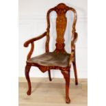 A 19TH CENTURY DUTCH WALNUT OPEN ARMCHAIR With floral marquetry inlay, serpentine rail and