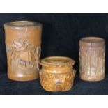 TWO CHINESE BAMBOO BRUSH POTS AND COVERS Along with a treen tobacco jar and cover. (largest 21cm)