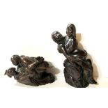 TWO ORIENTAL CARVED EROTIC NETSUKES Signed. (largest measures 8cm)