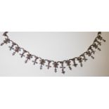 A HEAVY 18CT WHITE GOLD AND DIAMOND NECKLACE Formed with floral sprays. (39.4g)