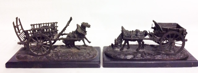 A PAIR OF 19TH CENTURY CONTINENTAL SPELTER HORSE AND CARTS One horse rearing and one grazing, raised