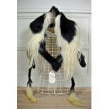 A LATE 20TH CENTURY TAXIDERMY COLOBUS MONKEY SKIN SHAWL With cream silk lining, garment label '