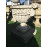 SMALL URN ON PLINTH