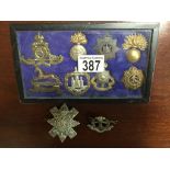 COLLECTION OF MILITARY BADGES, 10 PIECES IN CABERNET