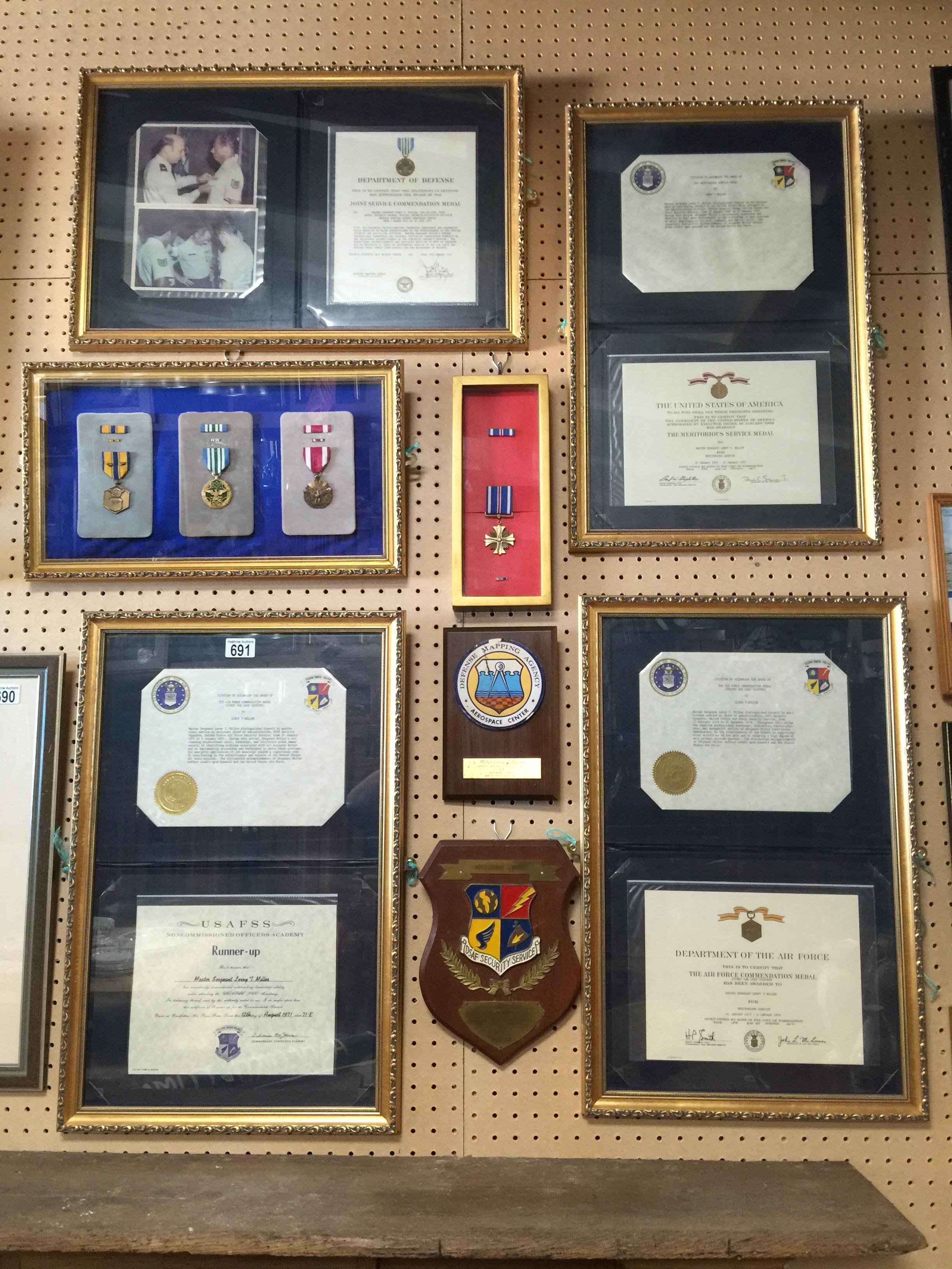 ASSORTED COLLECTION OF FRAMED AMERICAN MILITARY MEDAL LETTERS AND PLAQUES