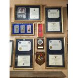 ASSORTED COLLECTION OF FRAMED AMERICAN MILITARY MEDAL LETTERS AND PLAQUES